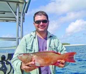 Briggsie was pleased to pull a couple of these coral trout from the western side of Masthead Island (in the background).